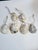 Set of six ornaments crafted from Connecticut Shores, Blue Point Oyster Shells with hand-applied gold rim. Each shell has...