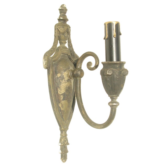 Single antique French Empire / Directoire bronze sconce sourced through a to-the-trade importer of European decorative...