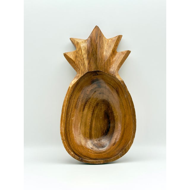 Add a touch of vintage tropical charm to your summer table with this set of 2 hand-carved wooden pineapple bowls, likely...