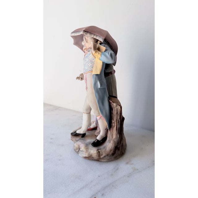 18th-Century Courting Couple Sharing a Parasol Under Pastel-Colored Period Attire. Glazed and Matte Porcelain Figurine For Sale In Greensboro - Image 6 of 15