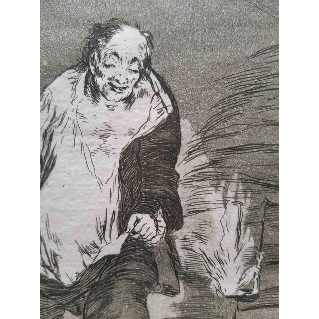 Y se le quema la casa is an original artwork realized by the artist francisco goya and published in 1799. Etching on...
