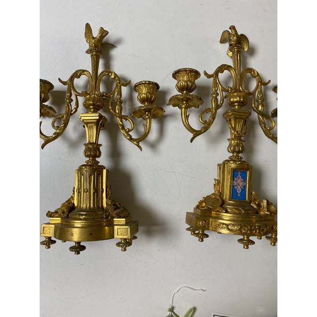 Exquisite pair of French gilt candlesticks from Paris with beautiful blue panel insert