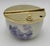 A charming vintage porcelain and polished brass covered sugar bowl featuring a blue-and-white Chinoiserie landscape motif...