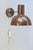 A rare Bunker wall lamp designed by Jo Hammerborg for Fog & Mørup, Denmark, dating from the 1960s. The Bunker was produced...