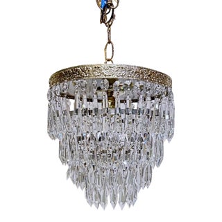 Vintage Hollywood Regency loral Embossed Brass Tiered Waterfall "Wedding Cake" Crystal Chandelier For Sale
