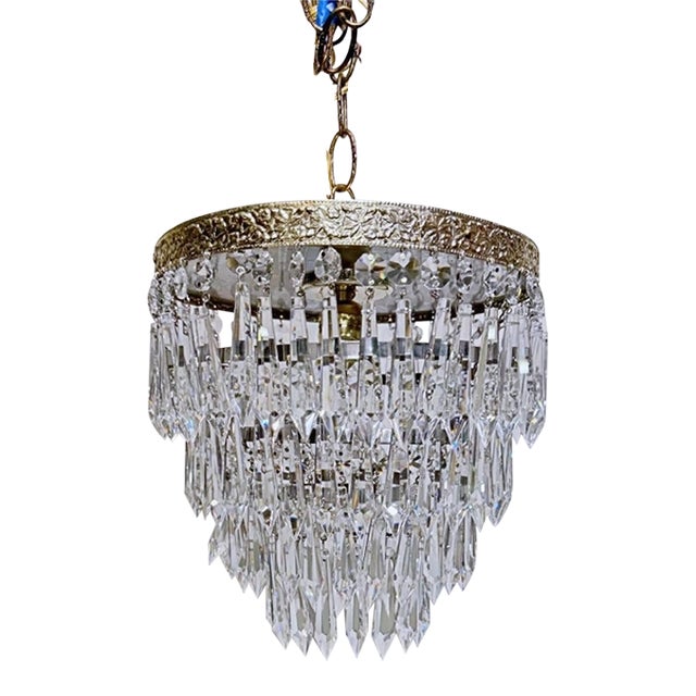 Vintage Hollywood Regency loral Embossed Brass Tiered Waterfall "Wedding Cake" Crystal Chandelier For Sale