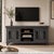 Dimensions: 69" W x 18" D x 32" H Give your home a grand and stately feel with this majestic two-door media console that...