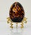 Amber Vintage Decorative Amber Tortoiseshell Glass Egg on Gilt Metal Stand For Sale - Image 8 of 10