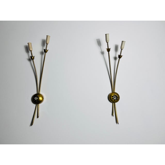 This rare and elegant pair of Sputnik wall lamps from Italy, dating back to the 1960s, exemplifies mid-century...