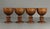 A beautiful set of four treen ware cups Finely crafted from turned exotic hard wood, raised on stems, most likely egg...
