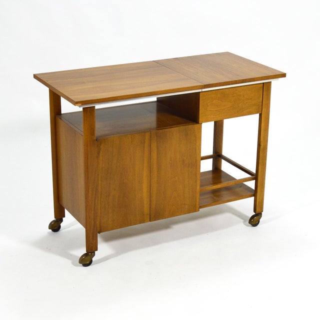 This striking John Widdicomb bar cart or serving cart has several great features: a terrific graphic quality with a...