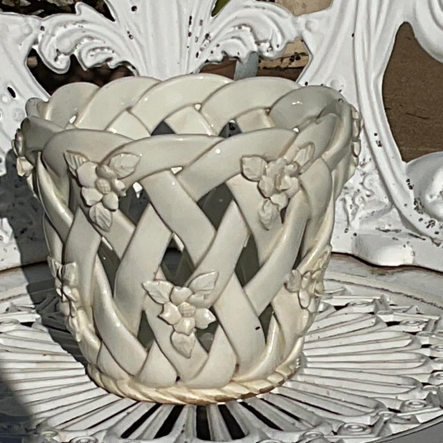 Antique white Italian Cachepot with delicate flowers at the lattice crosses. Elegant and finely crafted.