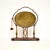 A wonderful antique Edwardian brass and oak dinner gong, made in England and dating from 1900-1910. It is a wonderful...