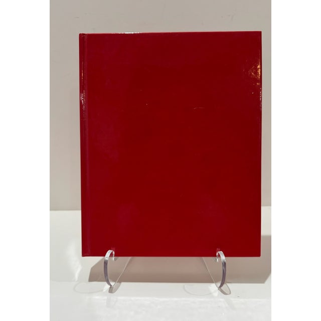 Curated lot of three iconic hardcovers spanning fashion, theater, and beauty. A striking trio for a coffee table, studio,...