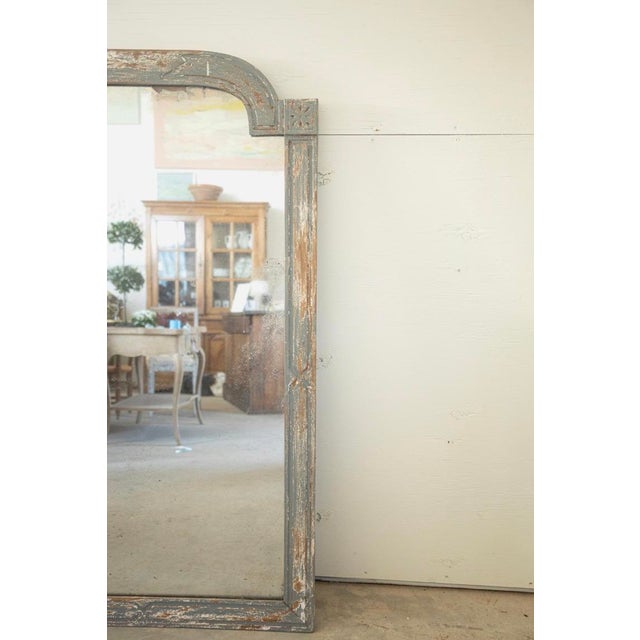 Discover the timeless beauty of our exquisite blue-grey Louis XVI style 19th-century mirror from France. This stunning...