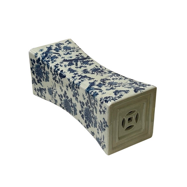 This striking Chinese blue and white porcelain pillow features a classic rectangular form with a gently curved, concave...
