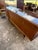 An exceptional French Art Deco Modern sideboard crafted in the 1940s and veneered in striking Macassar ebony. Showcasing...