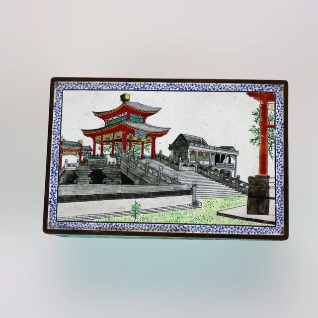 An exquisite antique Chinese cloisonné enamel jewelry box, dating to approximately C1930, presents a captivating scenic...