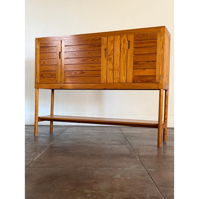 1960s French solid pine sideboard cabinet by Pierre Gautier-Delaye, in good vintage condition. Unsigned. Dimensions: 67.5”...