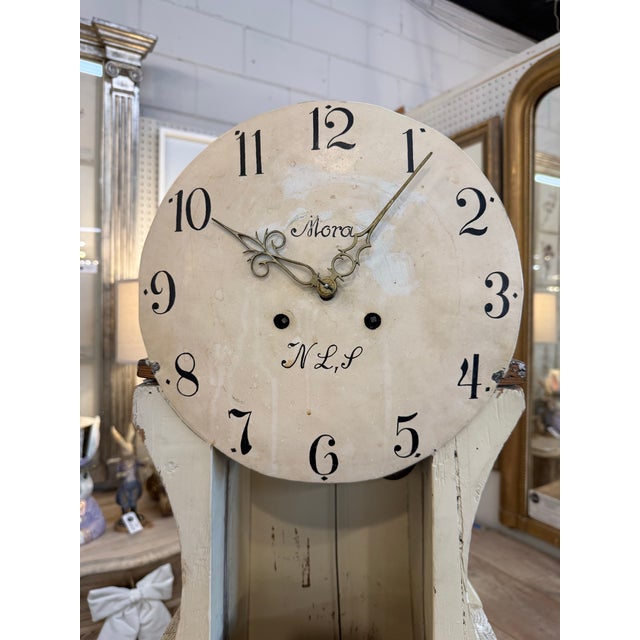 A striking 19th century Swedish Mora clock, retaining both of its original convex glasses and signed on the dial with...