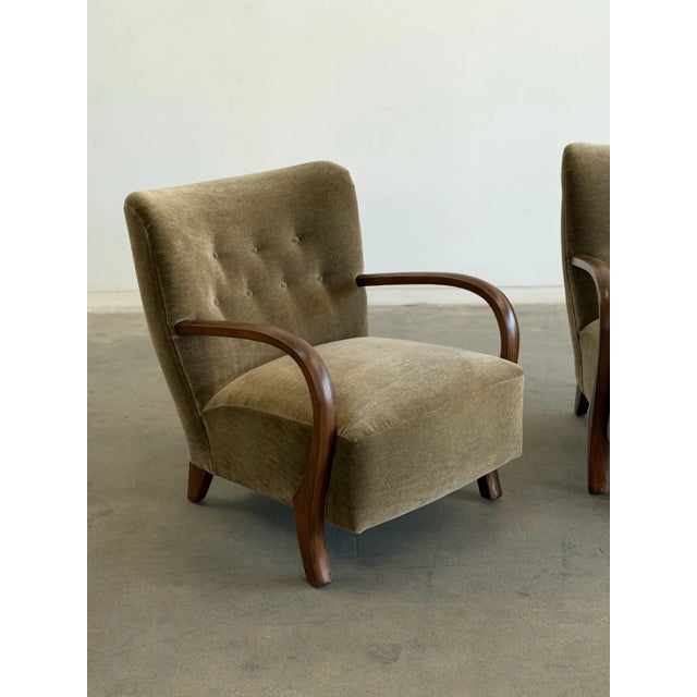 W25.5 D34 H31 SW21.5 SD21.5 SH17 AH22 An ode to art deco design, our custom made Jacques lounge chairs feature solid...