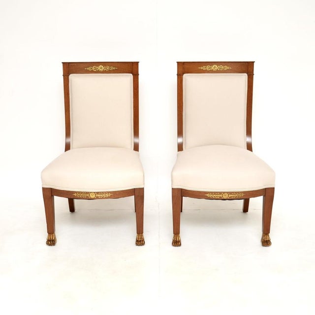 An impressive and beautifully designed pair of antique Swedish neoclassical side chairs. They are in the Gustavian style,...