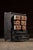 Early 20th Century Wooden 14 Drawer Rolling Shop Cabinet in Distressed Black For Sale - Image 4 of 10