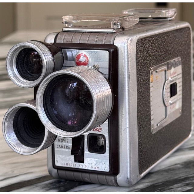 Presenting a bit of American film history for the media arts enthusiast or the home media room! Here is a Kodak Brownie in...