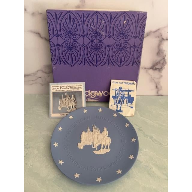 A vintage 1976 Wedgwood Jasperware collector plate, depicting the Victory at Yorktown, Virginia. The plate was part of the...