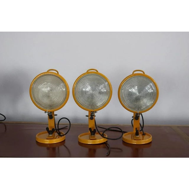 Cesare Leonardi and Franca Stagi for Lumenform, 'Jeep', wall light, yellow painted metal, steel, wire, Italy, 1969. This...