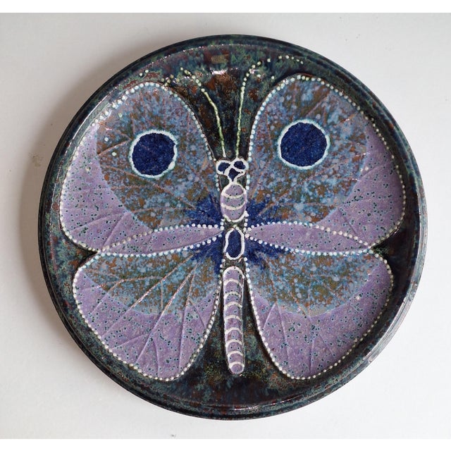 Swedish Wall Plate with a Blue Butterfly Motif by T. Hellström for Nittsjö Keramik, 1970s, in Very Good conditions....