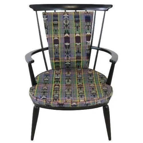 Timeless beauty. This black lacquered chair, to Danish/German design, is a strong design because of its slender and its...