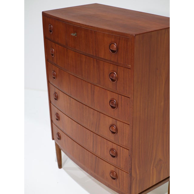Beautiful chest of drawers with curved front, designed by kai kristiansen in denmark during the 1960s. This piece is...