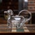 Antique 19th Century Victorian silver plated & glass dog shaped claret jug. The jug features a meticulously crafted glass...