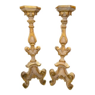 Pair of Early 19th Century Italian Carved and Parcel Gilt Altar Sticks For Sale