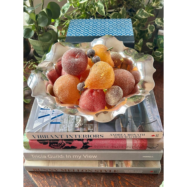 Perfect as a center bowl on a sideboard or entry table, this silver plate bonbon bowl adds sparkle and shine. The...