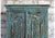 A captivating statement piece, this antique blue carved armoire brings together old-world artistry and rustic elegance....