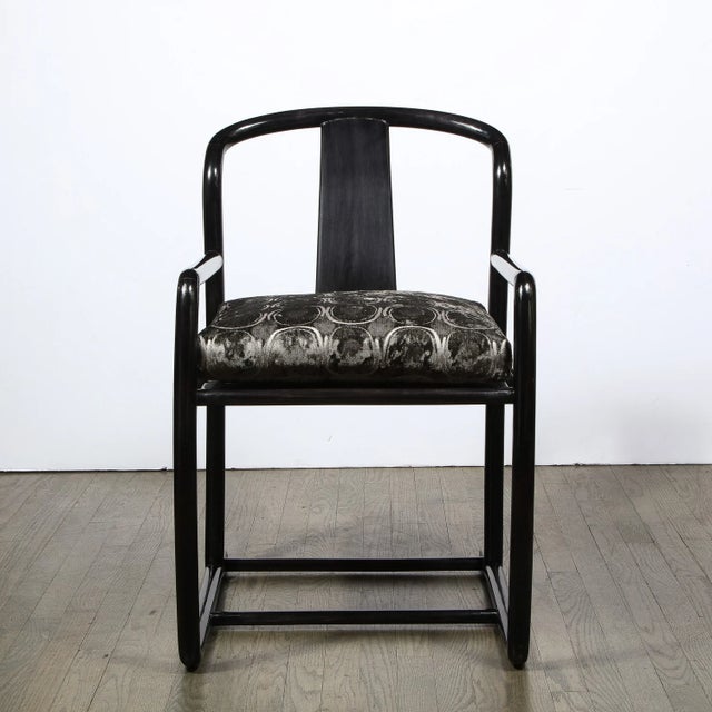 This sophisticated and elegant pair of arm chairs were realized in the United States by the great Angelo Donghia circa...