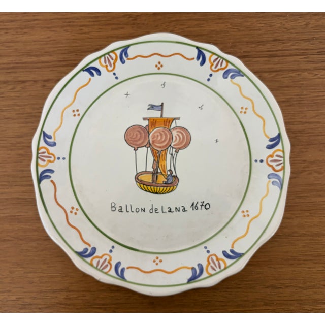 Rarely found in such a large, nearly complete service, this 49-piece French La Révolution stoneware dinnerware set dates...