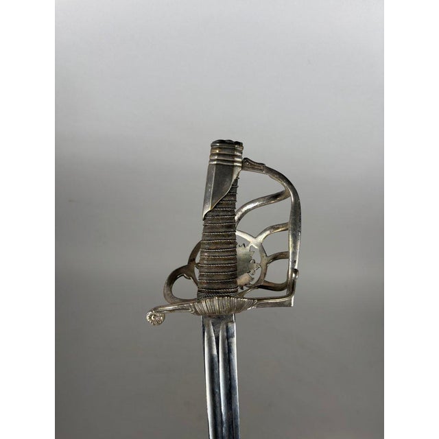 Sabre of the 2nd company of Musketeers "black" of the King's Household, model 1814.Silvered brass hilt. Shagreen-covered...