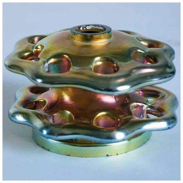 An antique, two-tier glass flower frog by Steuben. STYLE Art Nouveau COLOR(S) Gold PLACE OF ORIGIN United States MAKER...