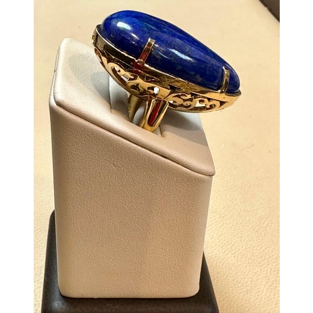 Vintage Beautiful Filigree Ring in 14 Karat yellow gold This is a ring which has a 63 carat of high quality natural Lapis...