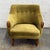 A charming Danish modern lounge chair from the 1950s, upholstered in a warm olive mohair or mohair-like fabric with teak...