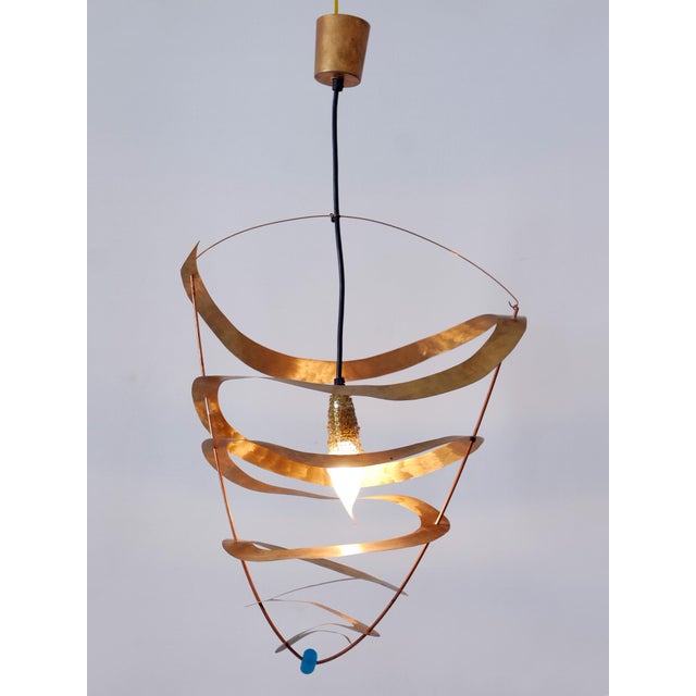 Exceptional and highly decorative postmodern pendant lamp or hanging light. Designed and manufactured probably in italy,...