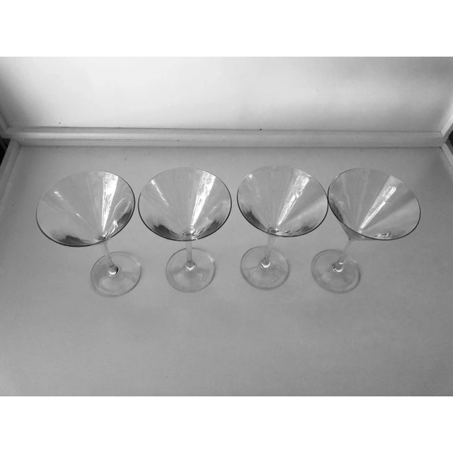 Contemporary , set of 4 martini glasses 7.5"H X 4.75"D , Makers mark reads "French" Excellent condition.