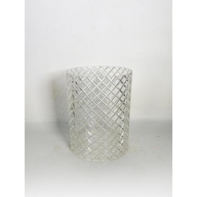 Acrylic glass wastebasket, France, 1970s, with an elegant and decidedly modern design. Made of transparent acrylic glass,...