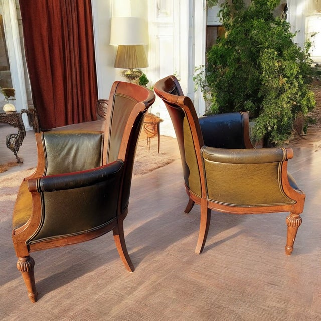 A testament to enduring craftsmanship and sophisticated design, these chairs are more than just seating; they are a...