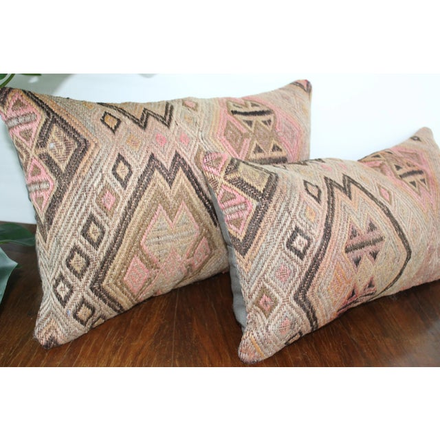 This Turkish pillow cover measures is made from the highest quality antique Kilim in 100% wool on the front. The back is...