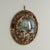 Enchanting 19th century English Sailors valentine handcrafted in exotic seashell lovingly arranged around an image of a...