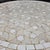 Beautiful handcrafted Moroccan mosaic table featuring an elegant beige and white color palette. Measuring 32 inches in...